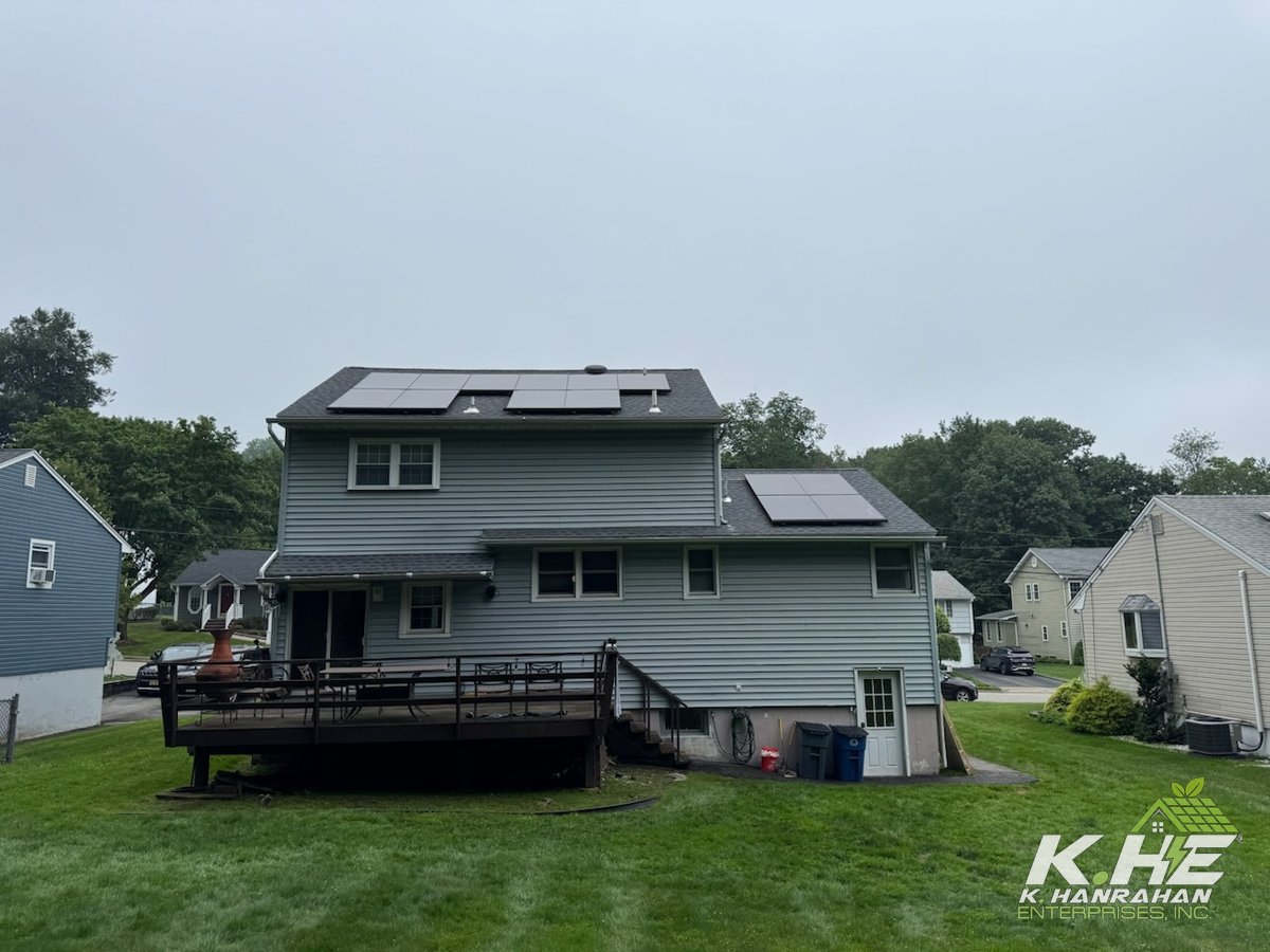 Front view of cape cod home with full roof solar